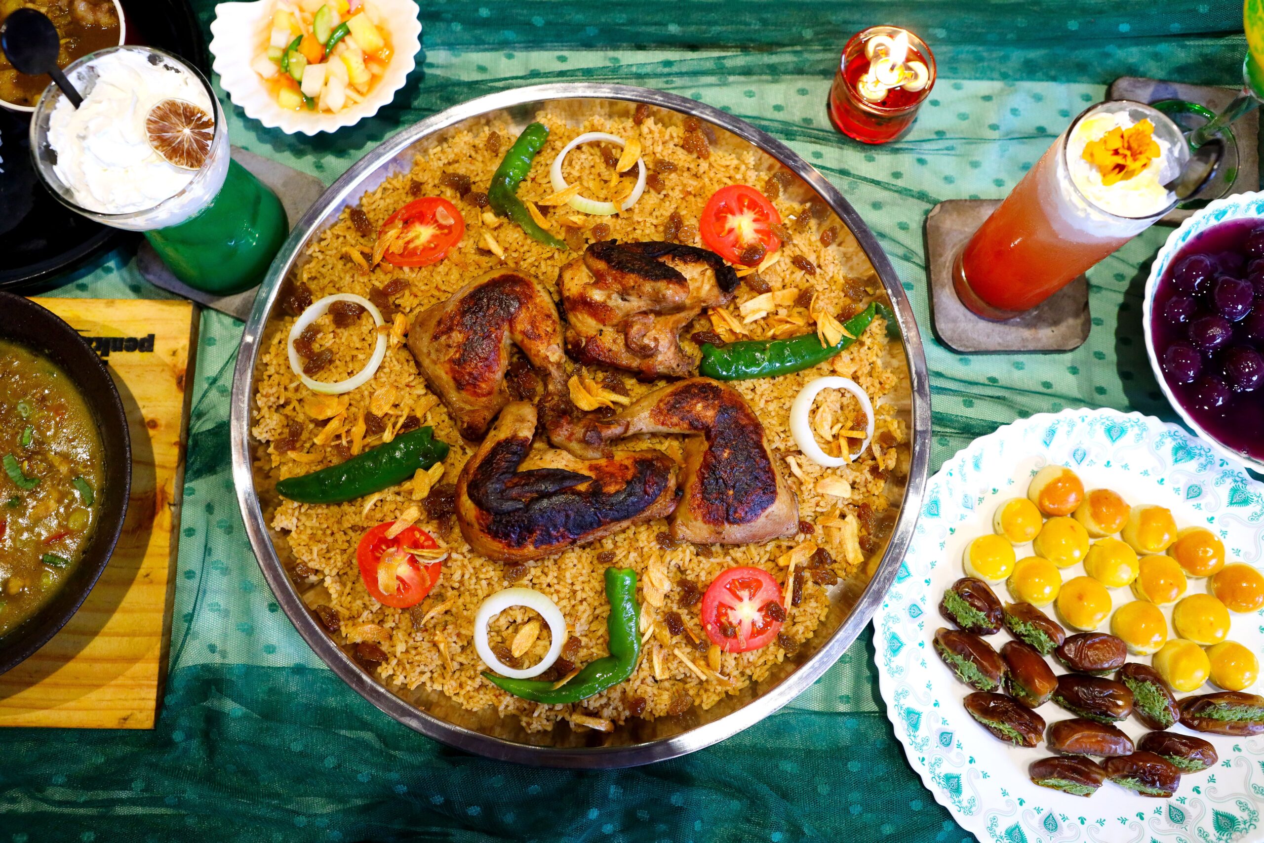 pexels photo 36639894 36639894 1 Rich display of Indonesian cuisine, showcasing traditional grilling and vibrant beverages.