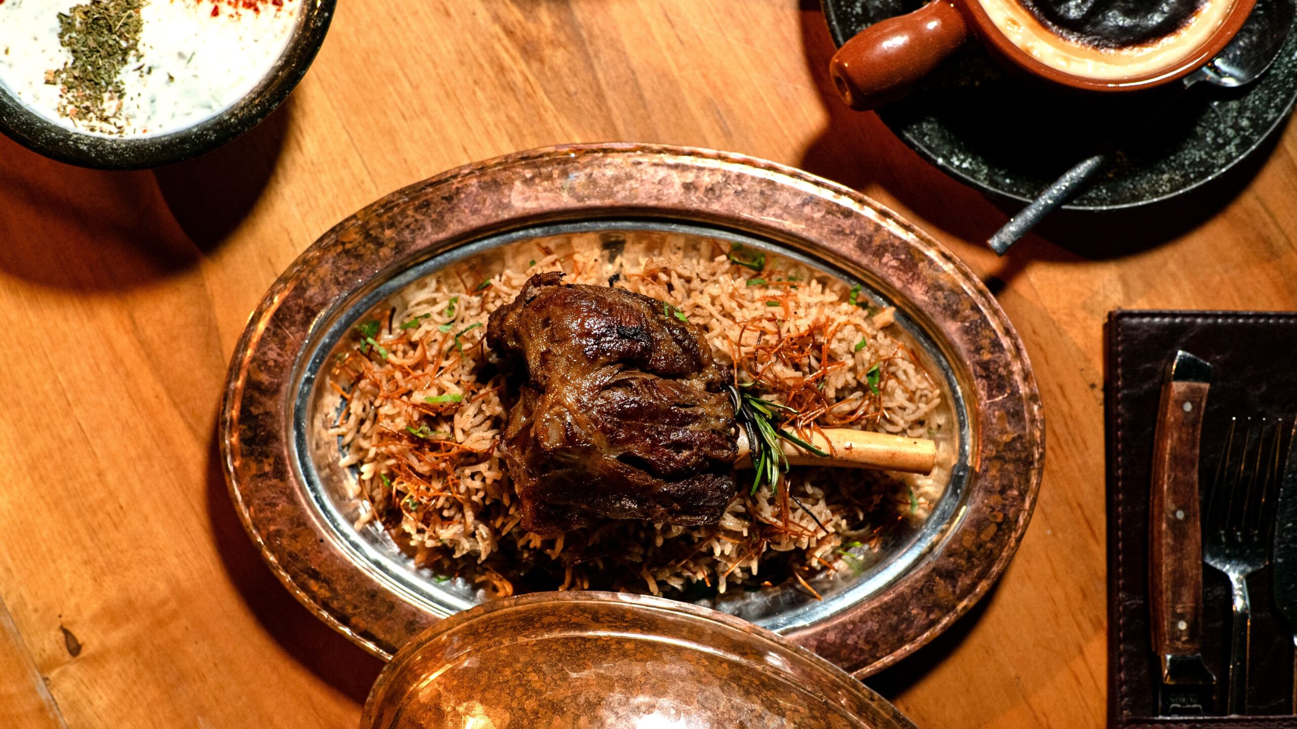 pexels photo 36934936 36934936 Tantalizing lamb shank served on aromatic basmati rice, perfect for gourmet meals.